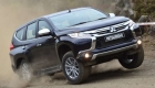 Mitsubishi Pajero Sport едет по бездорожью Mitsubishi Pajero Sport едет по бездорожью